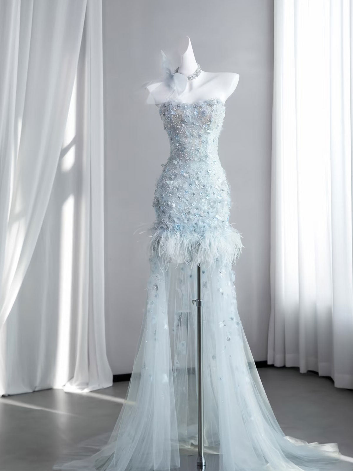 Ice Blue Beaded Feather Mermaid Evening Gown