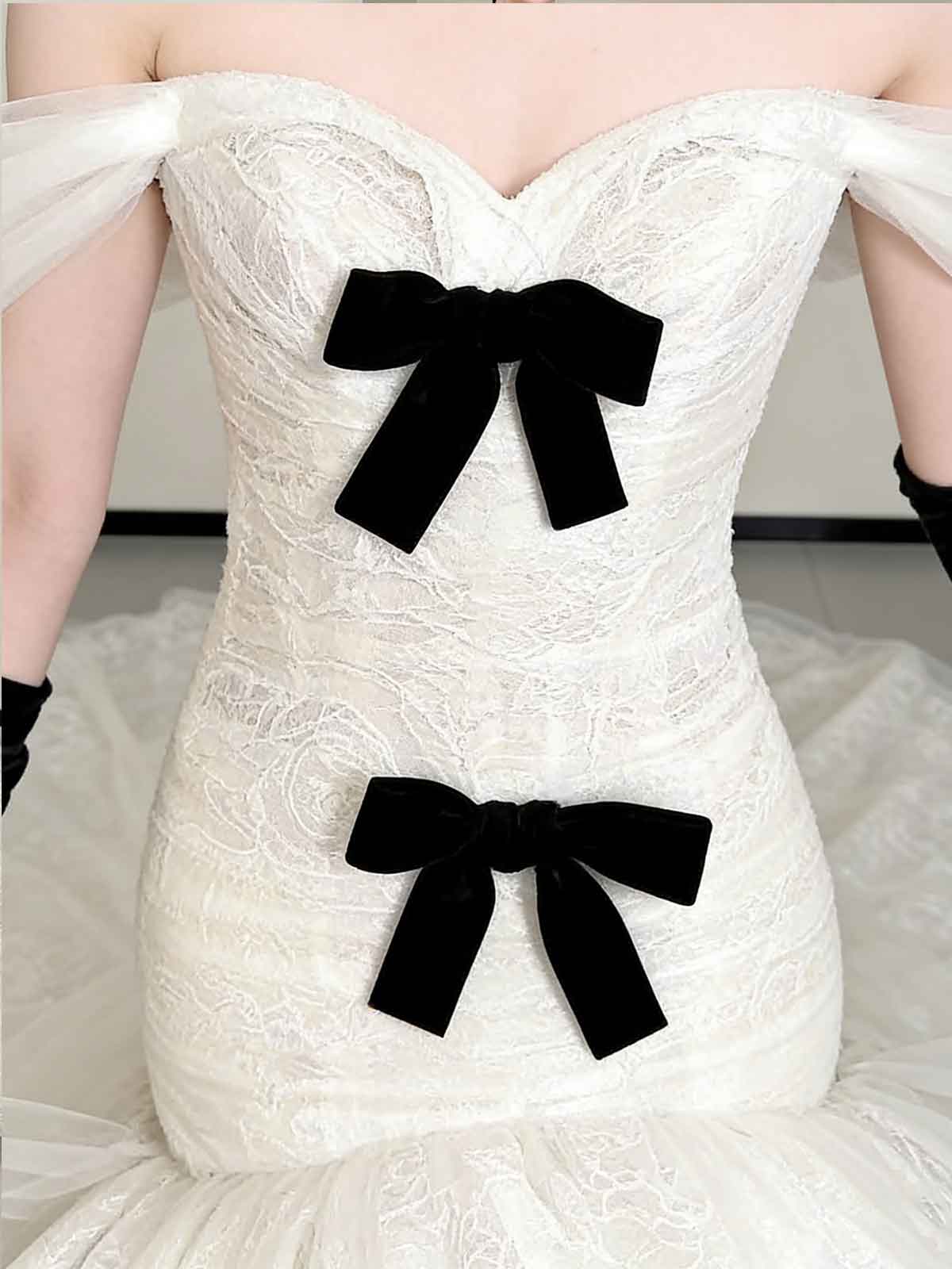 Elegant Off-Shoulder White Mermaid Wedding Dress with Bows