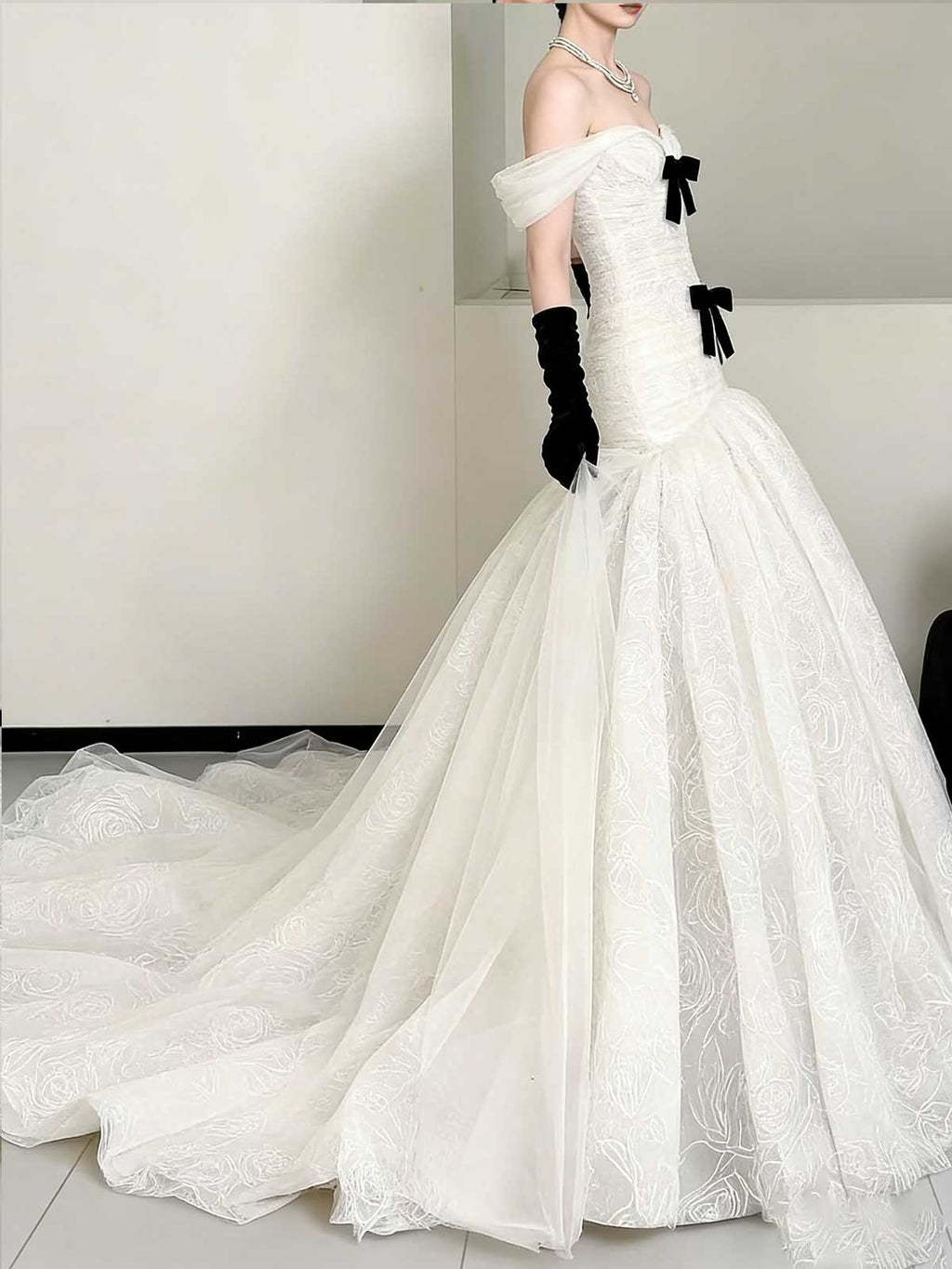 Elegant Off-Shoulder White Mermaid Wedding Dress with Bows