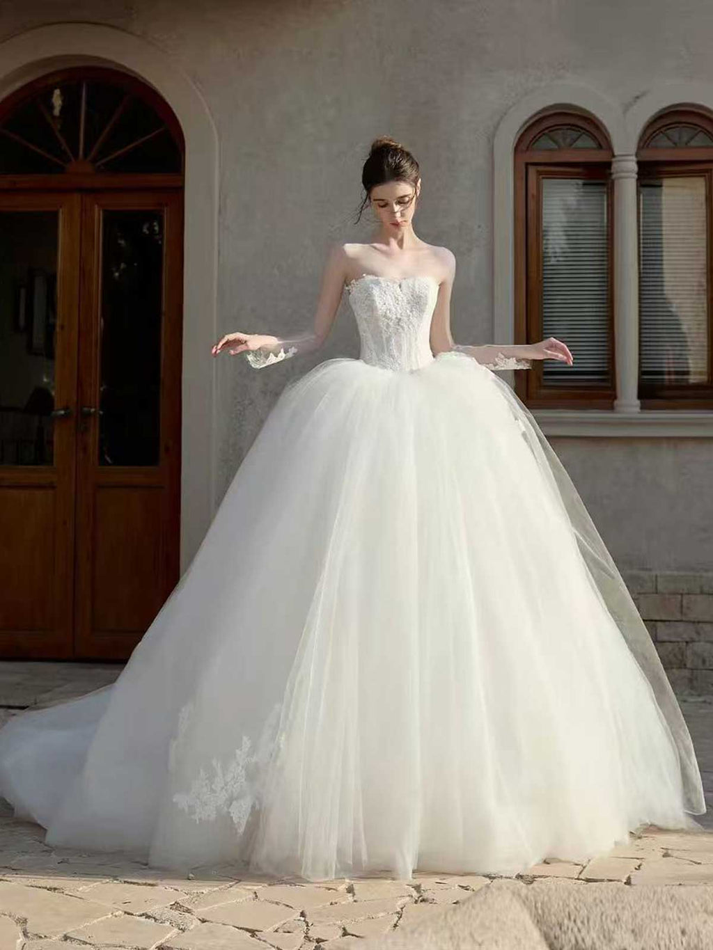 Strapless Lace Corset Ball Gown Wedding Dress with Voluminous Tulle Skirt
