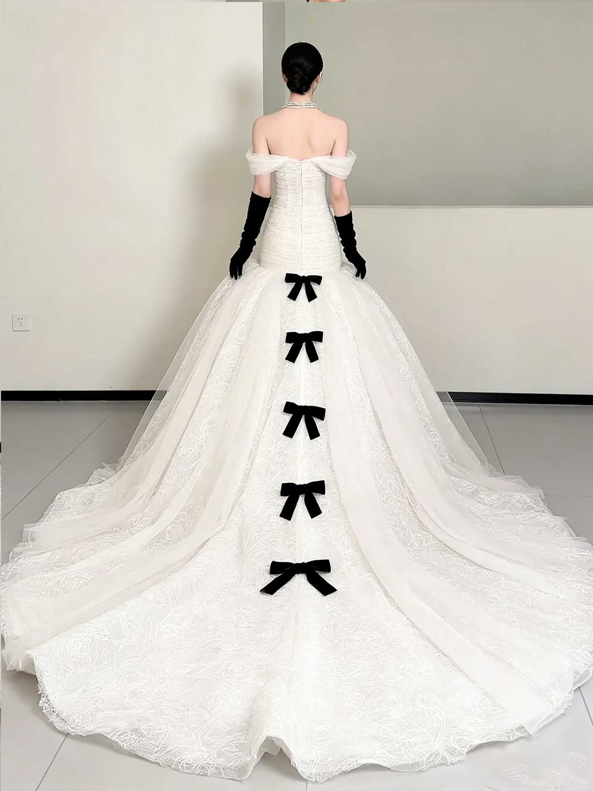 Elegant Off-Shoulder White Mermaid Wedding Dress with Bows