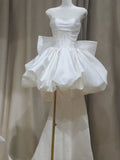 White Strapless High-Low Gown with Pearl Chains & Oversized Bow Back