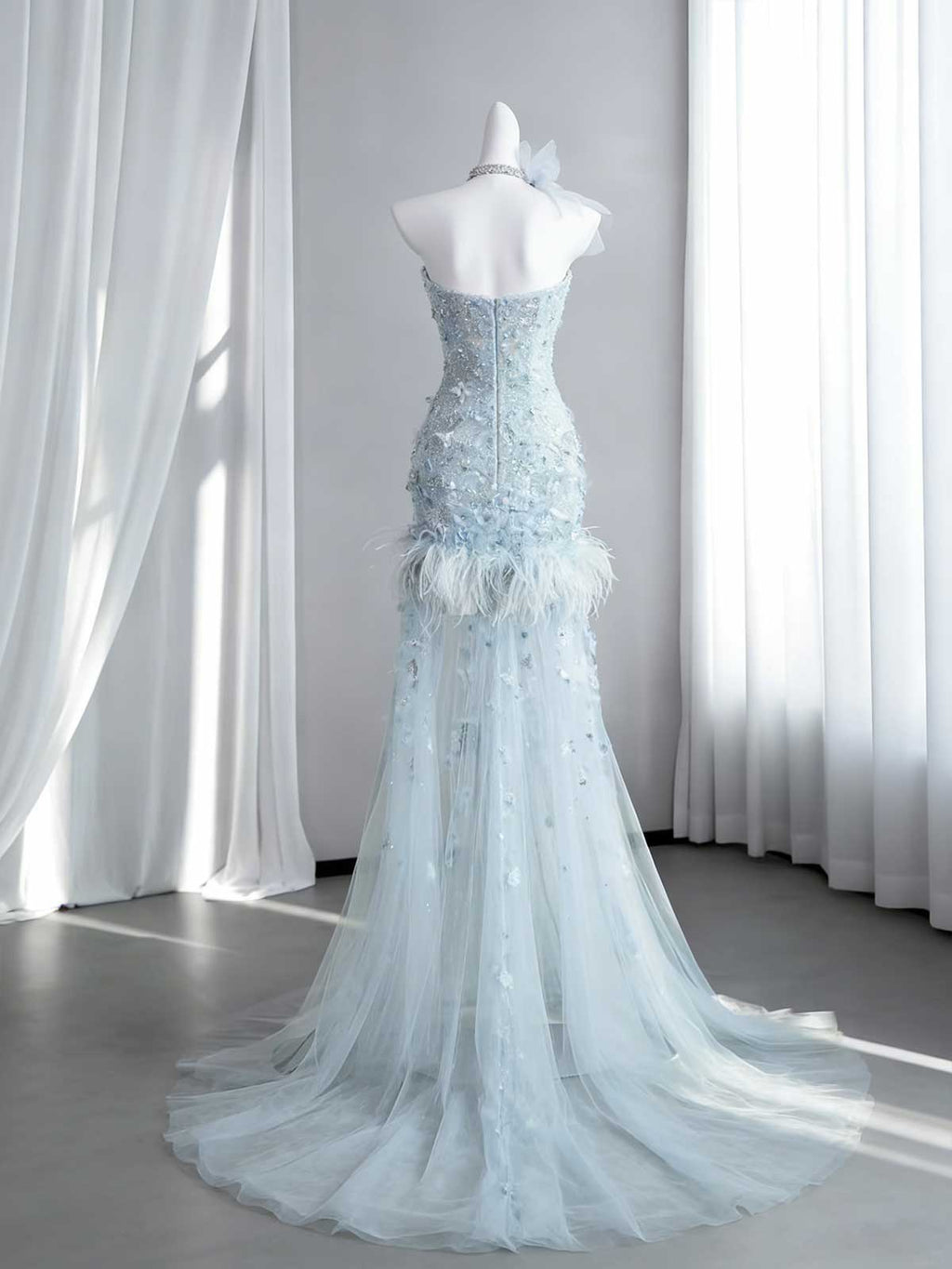 Ice Blue Beaded Feather Mermaid Evening Gown