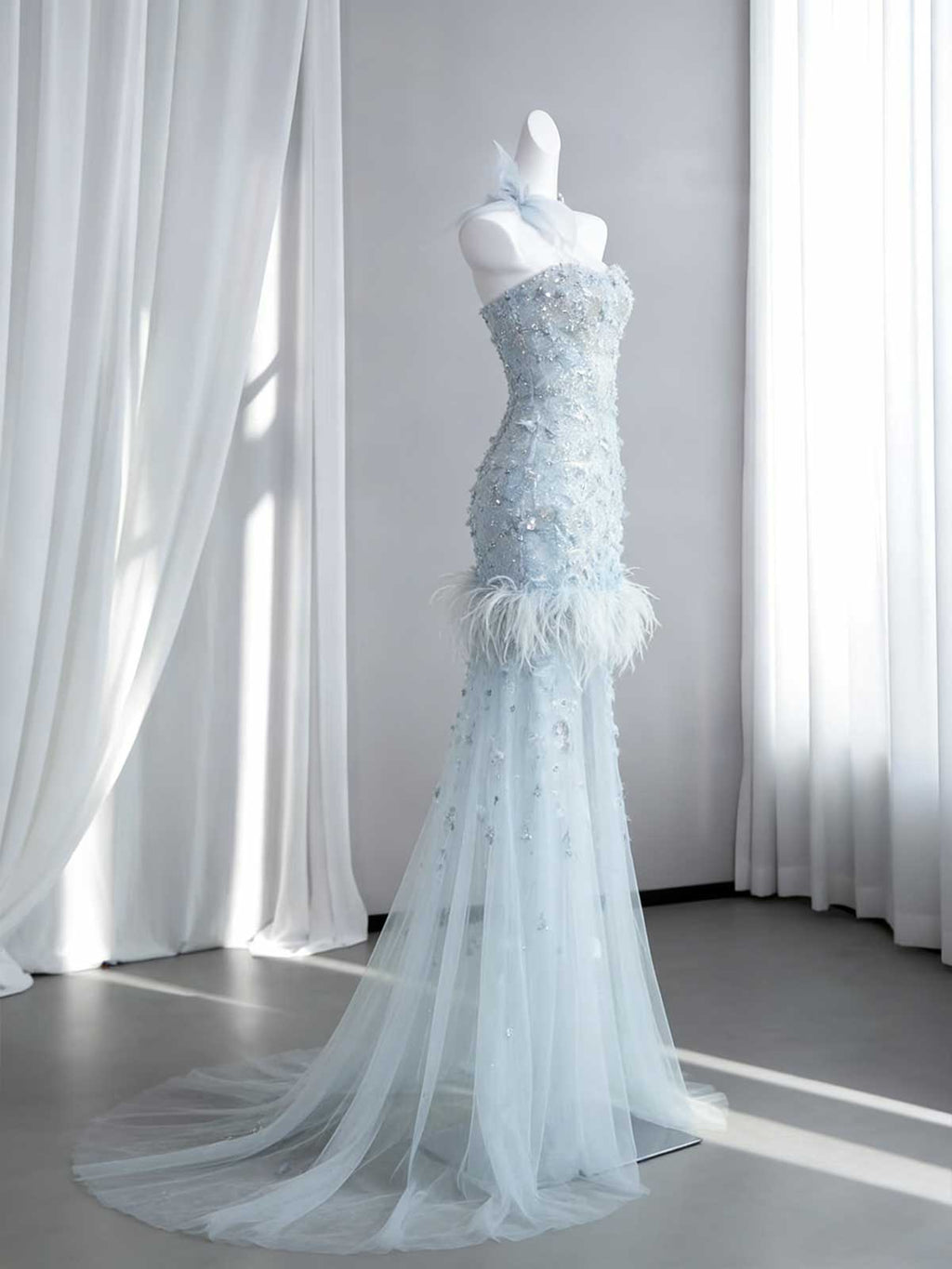 Ice Blue Beaded Feather Mermaid Evening Gown