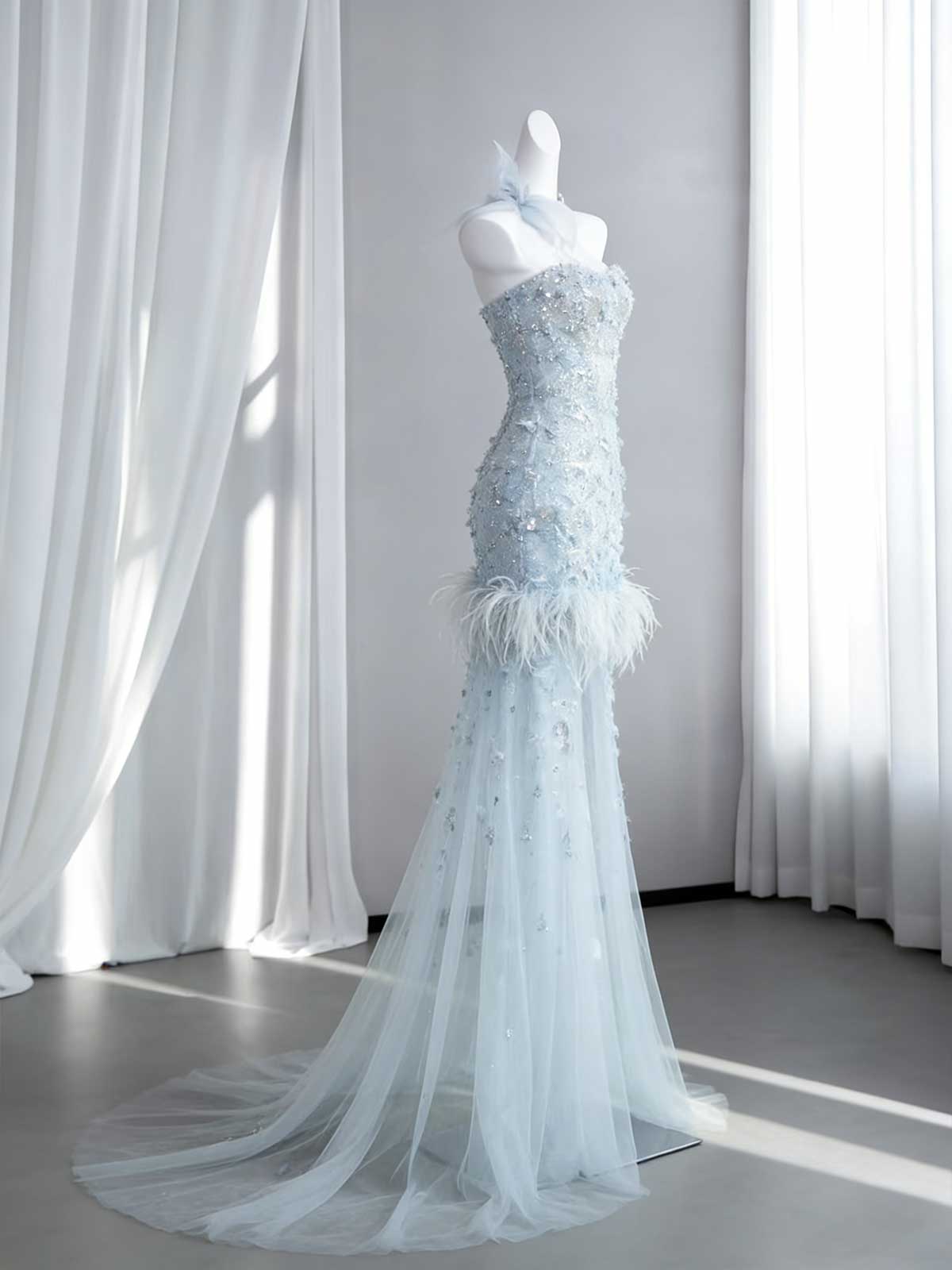 Ice Blue Beaded Feather Mermaid Evening Gown