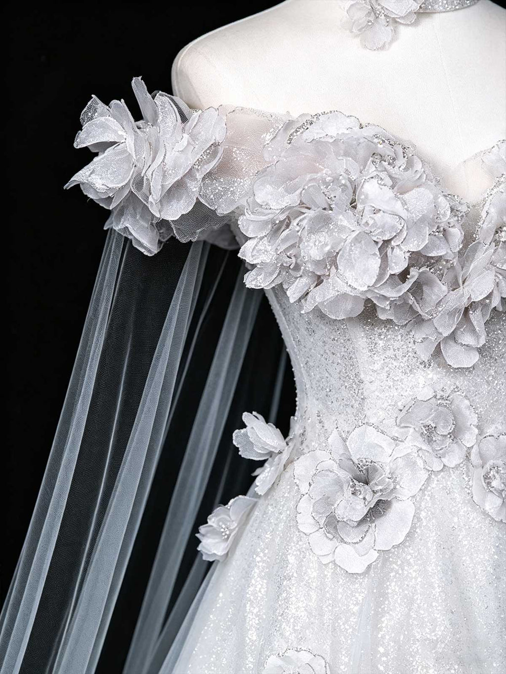 White Off-the-Shoulder Sequin Ball Gown with 3D Floral Appliqués and Cape Train