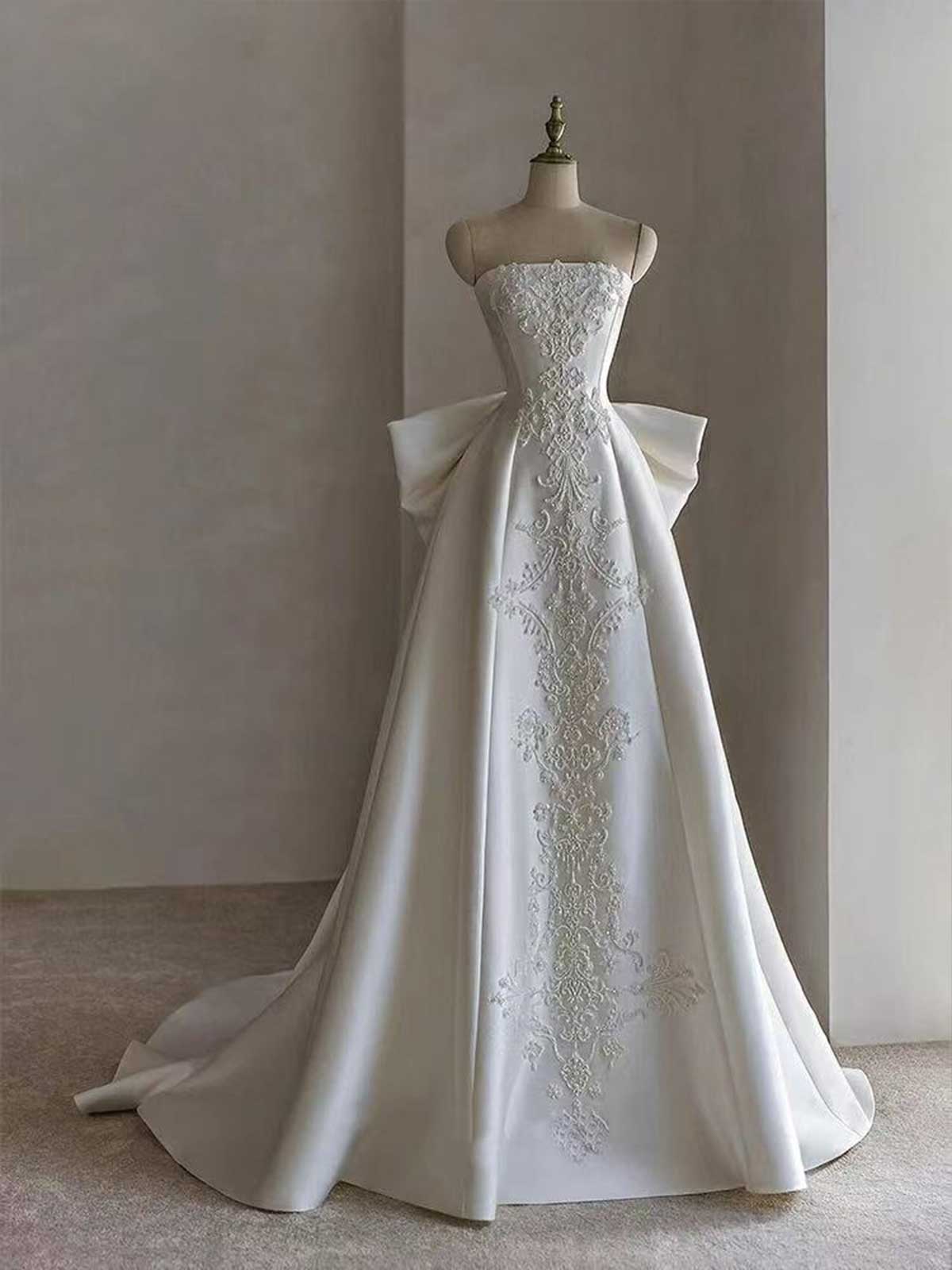 White Strapless Satin Ball Gown with Embroidered Panel & Oversized Bow Back