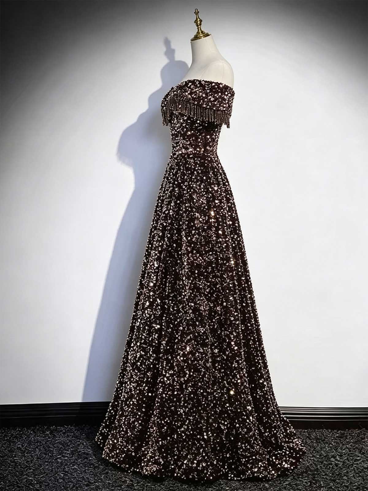 Black and Gold Off-the-Shoulder Sequin Ball Gown with Fringe Trim