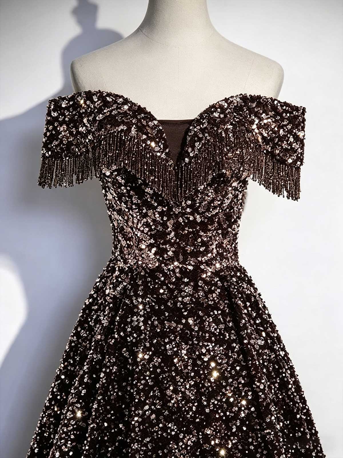Black and Gold Off-the-Shoulder Sequin Ball Gown with Fringe Trim