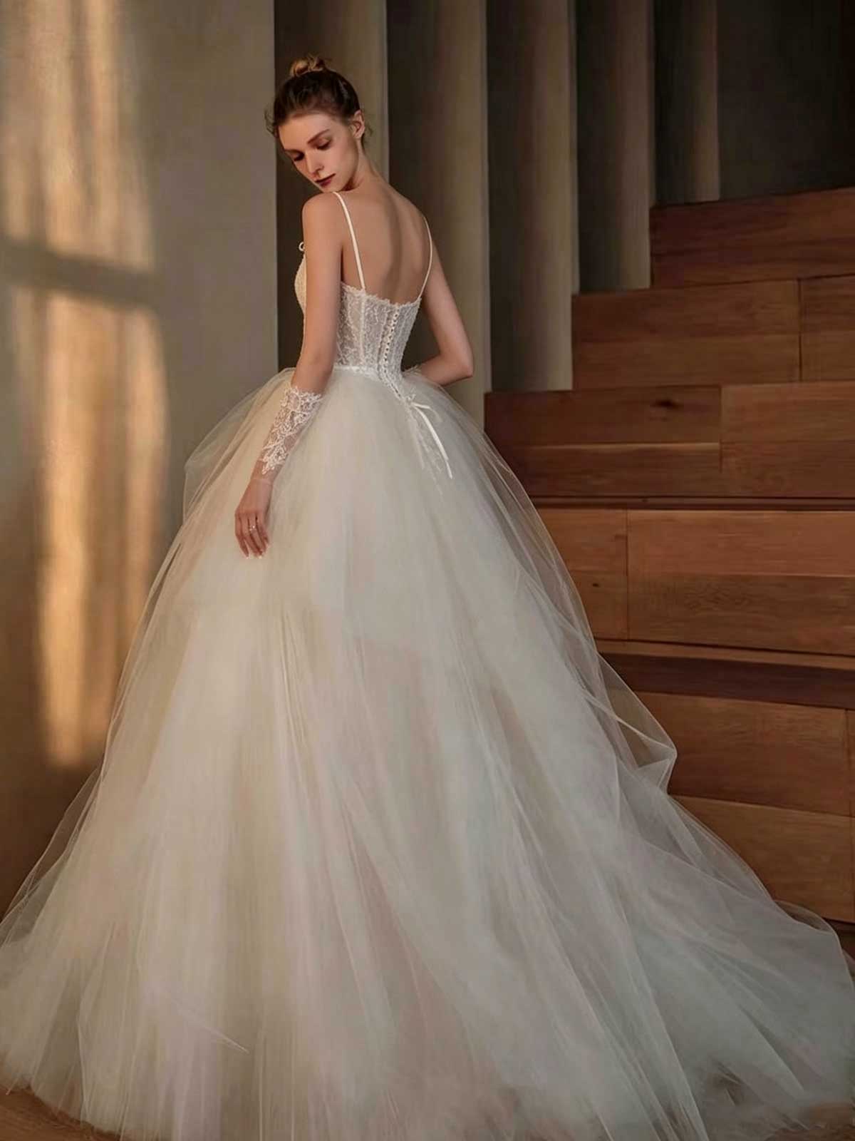 Ivory Lace Spaghetti Strap Wedding Dress with Voluminous Tulle Skirt