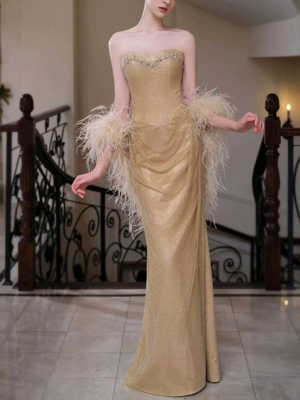 Gold Strapless Rhinestone Mesh Mermaid Evening Gown with Feather Cuffs