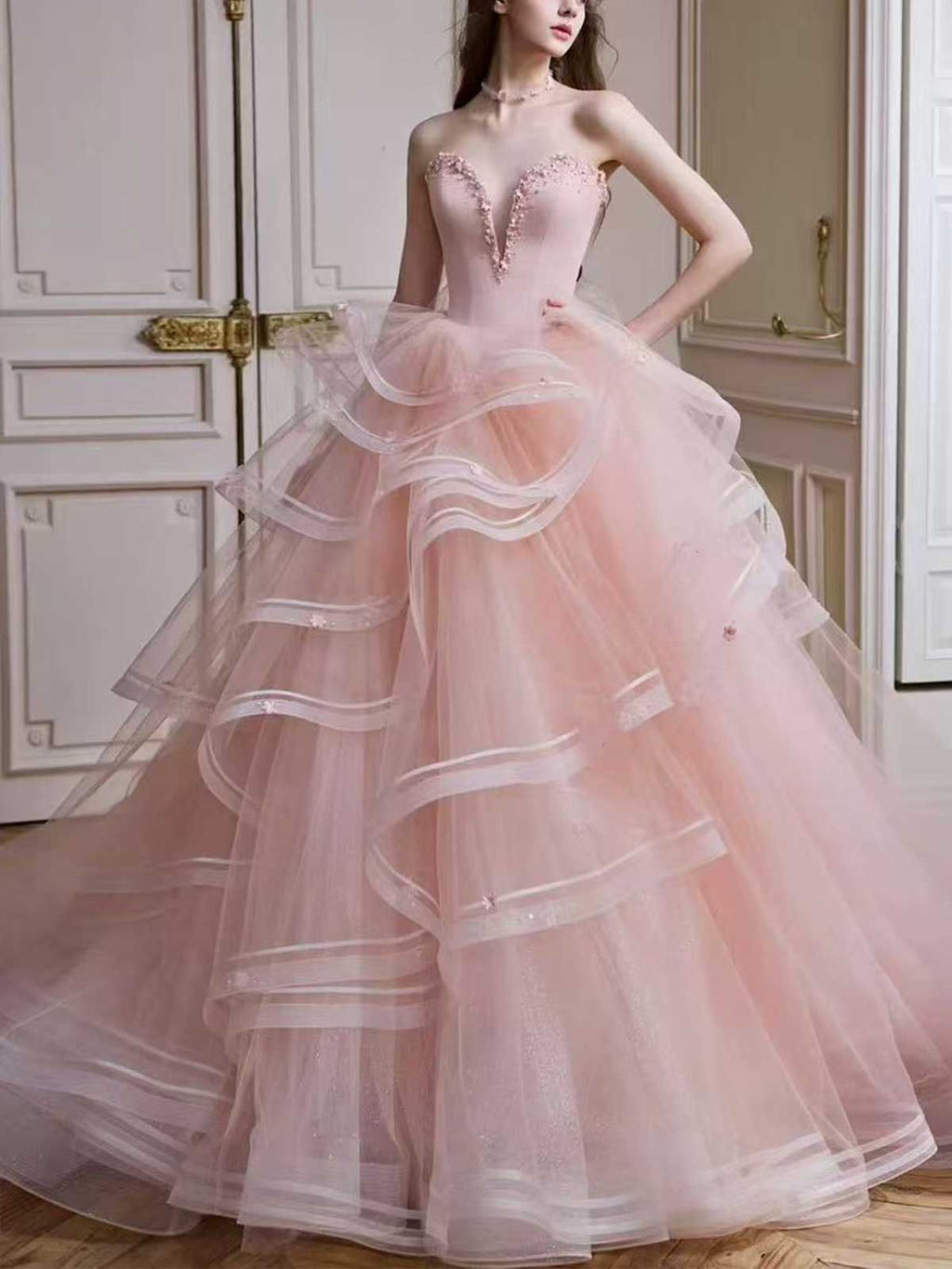 Blush Pink Strapless Tiered Tulle Ball Gown with Ruffled Layers