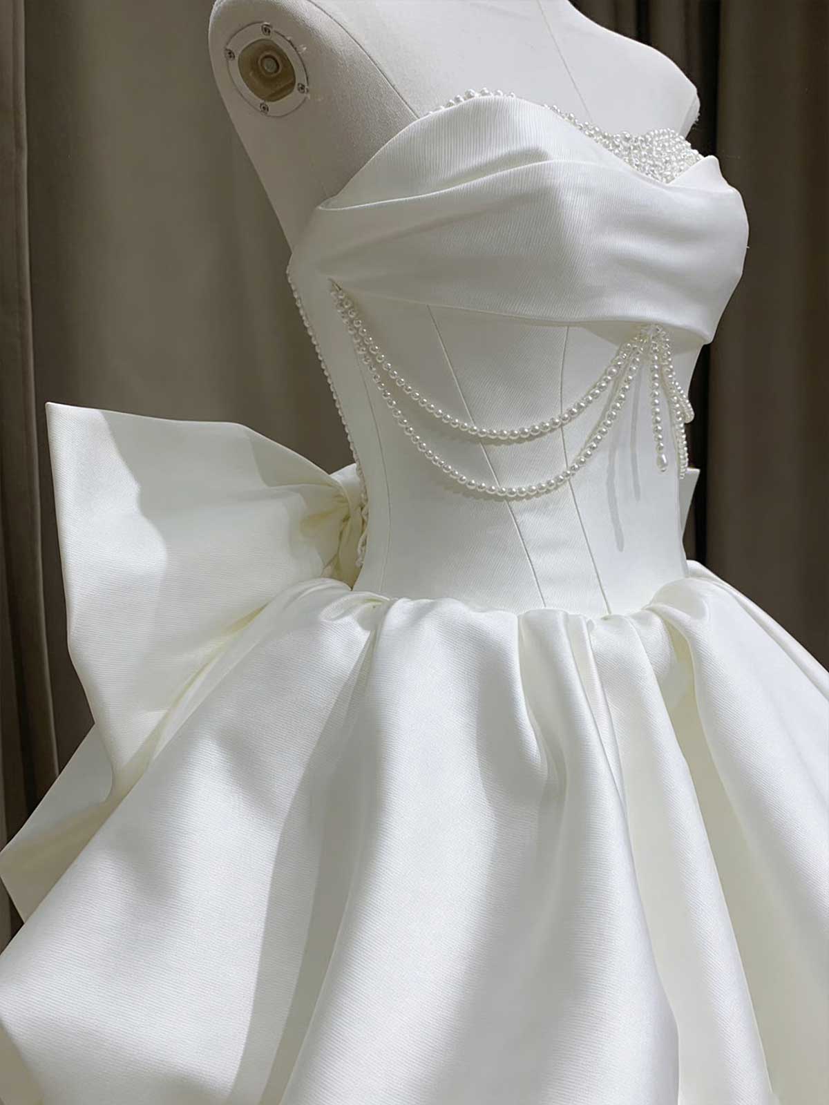 White Strapless High-Low Gown with Pearl Chains & Oversized Bow Back