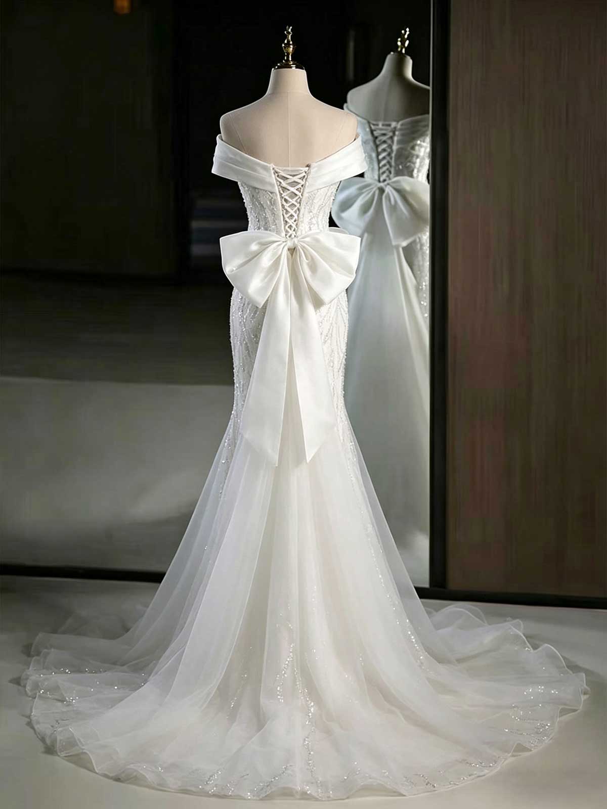 White Off-the-Shoulder Lace Mermaid Wedding Dress with Oversized Bow