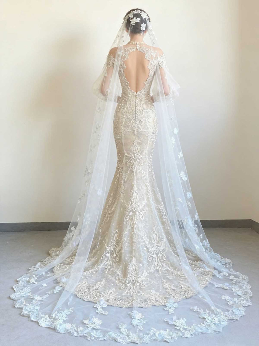 Luxury Champagne Mermaid Bridal Gown with Floral Embellished Train