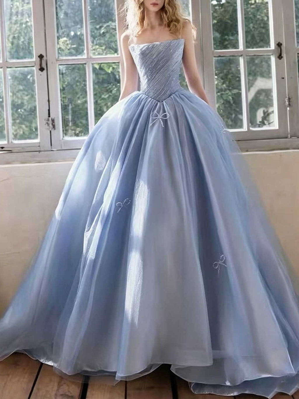 Ice Blue Strapless Tulle Ball Gown with Bow Appliqués