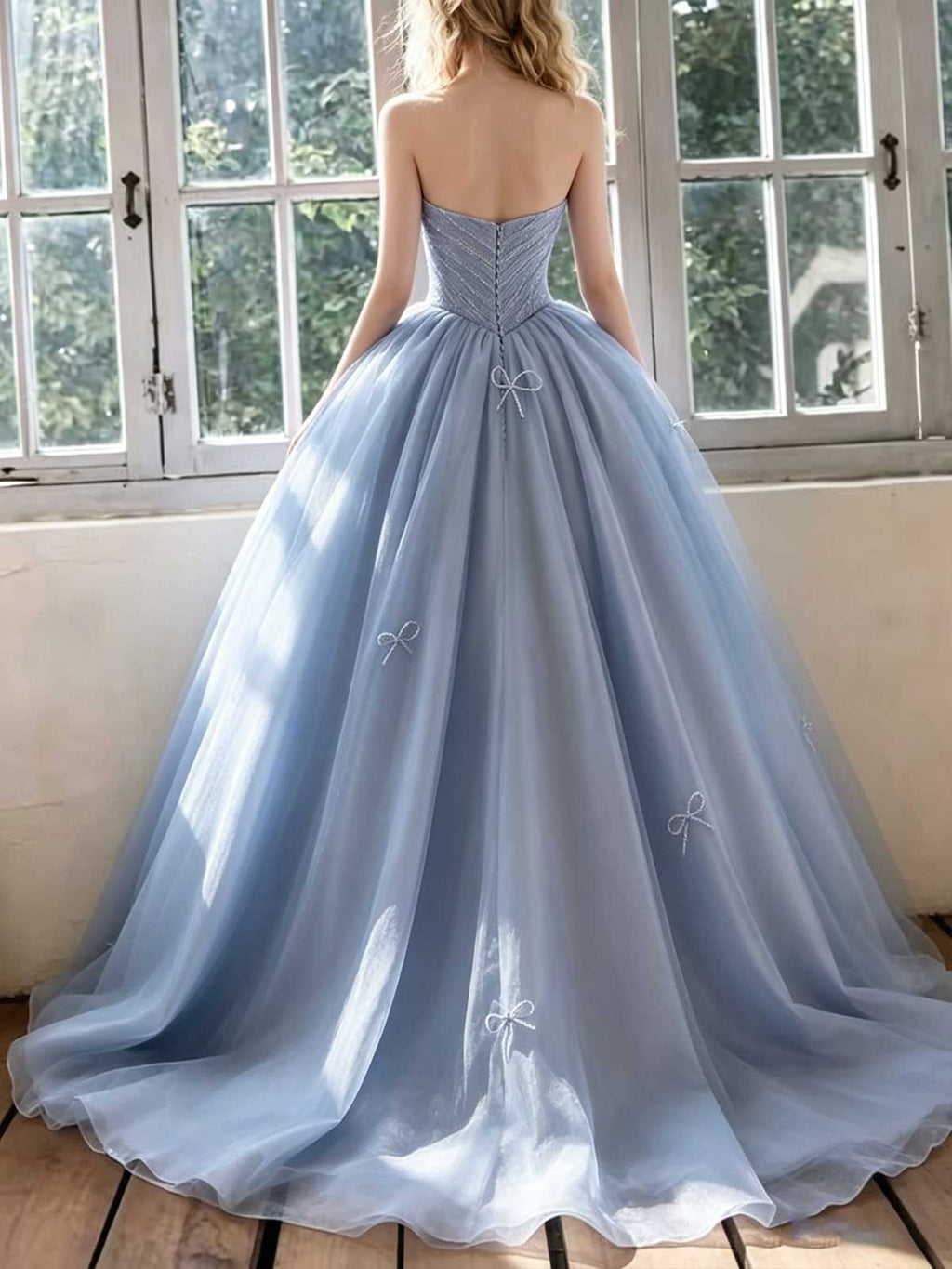 Ice Blue Strapless Tulle Ball Gown with Bow Appliqués