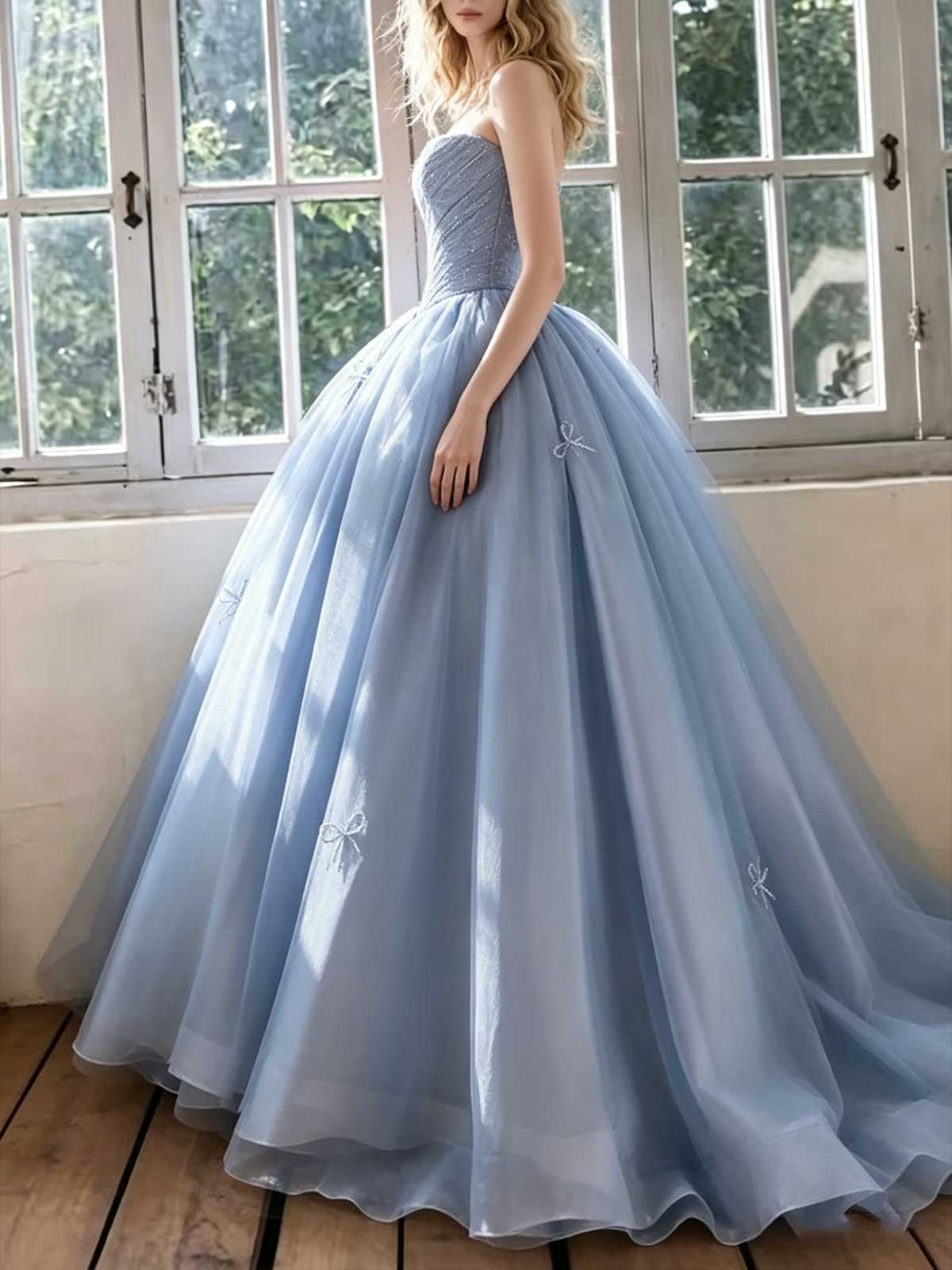 Ice Blue Strapless Tulle Ball Gown with Bow Appliqués