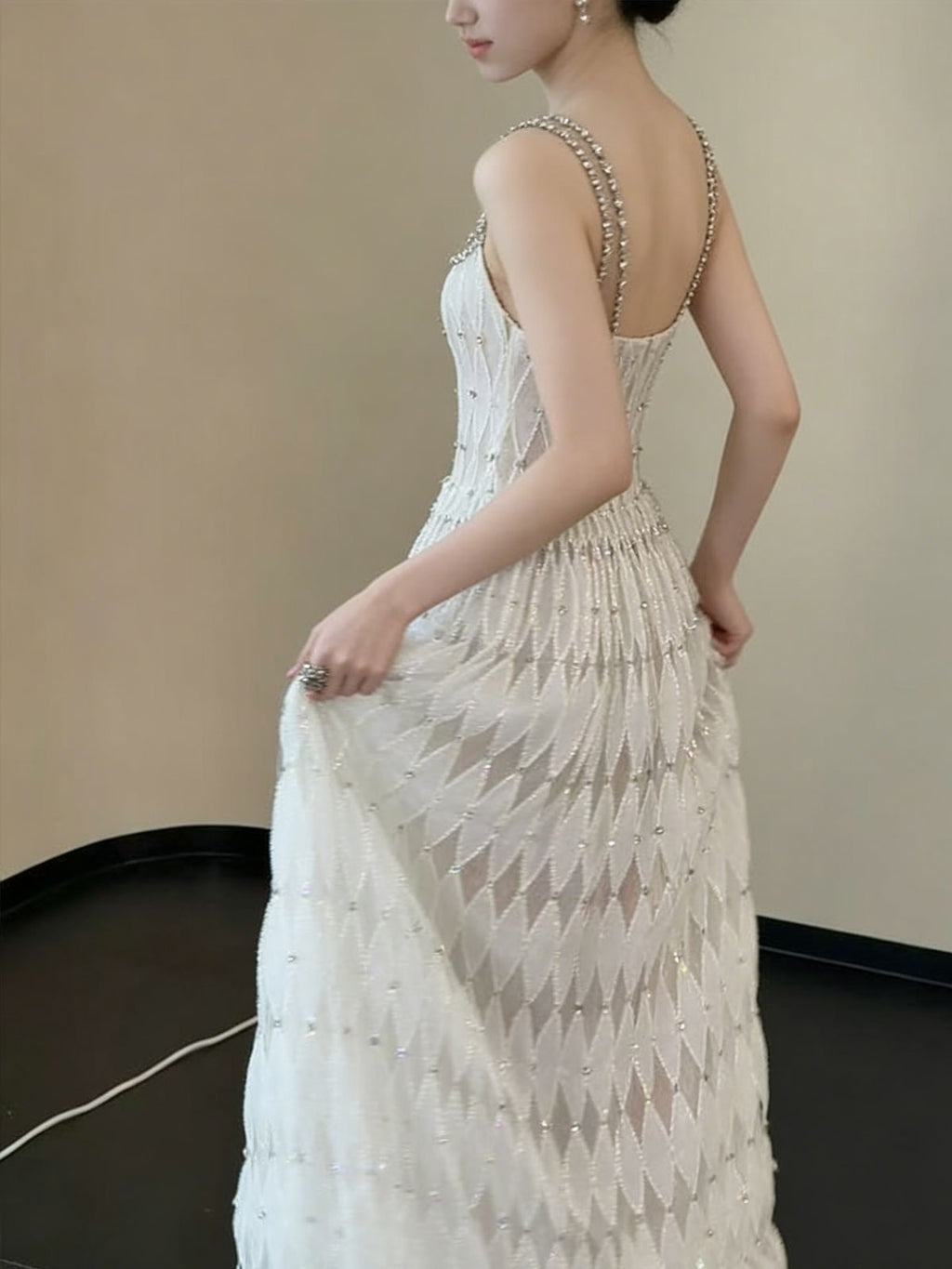 White Sleeveless Gown with Diamond Texture & Crystal Embellished Neckline