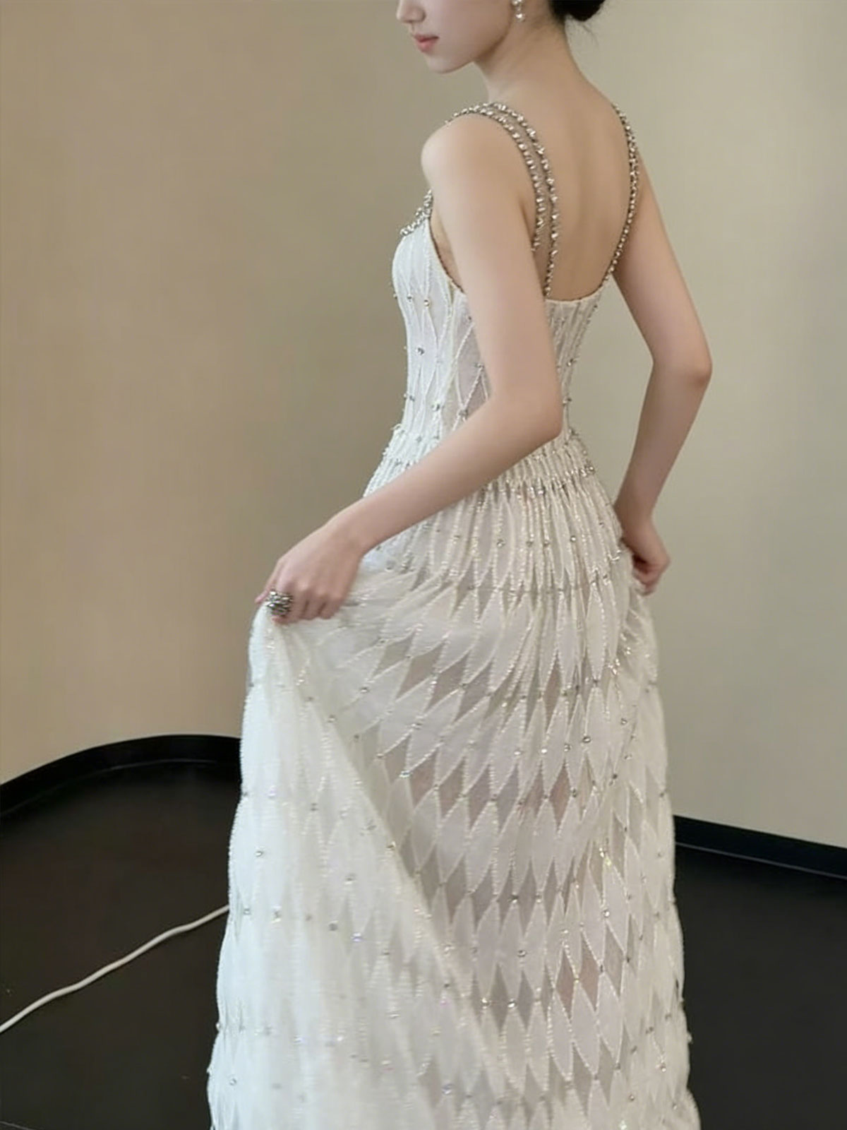 White Sleeveless Gown with Diamond Texture & Crystal Embellished Neckline