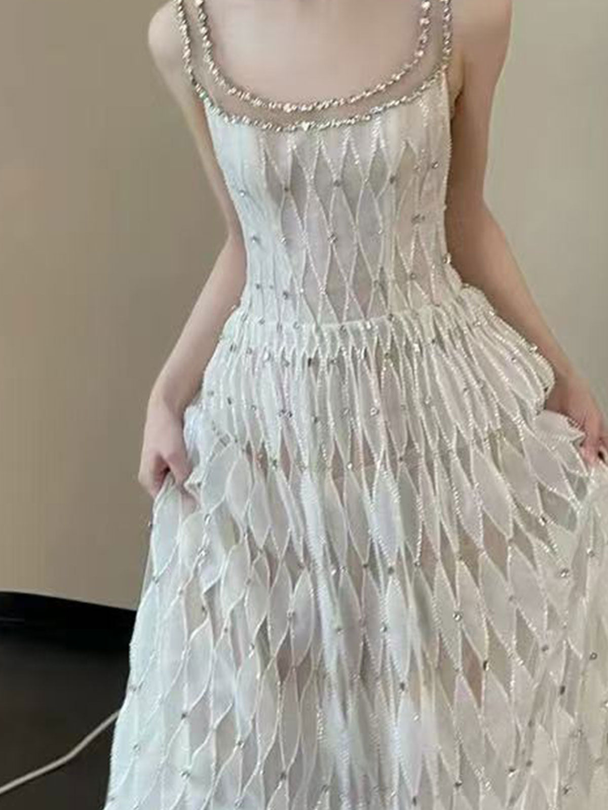 White Sleeveless Gown with Diamond Texture & Crystal Embellished Neckline