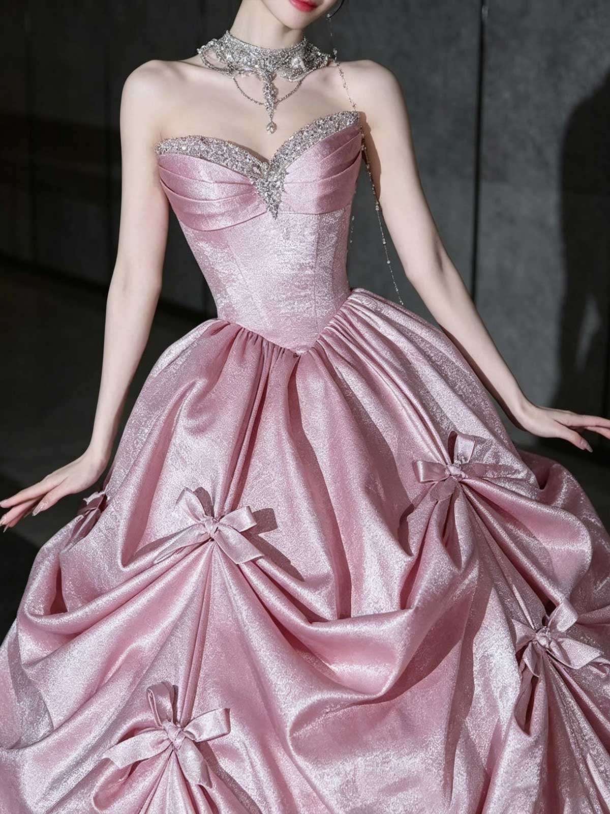 Blush Pink Strapless Satin Ball Gown with Bow Details