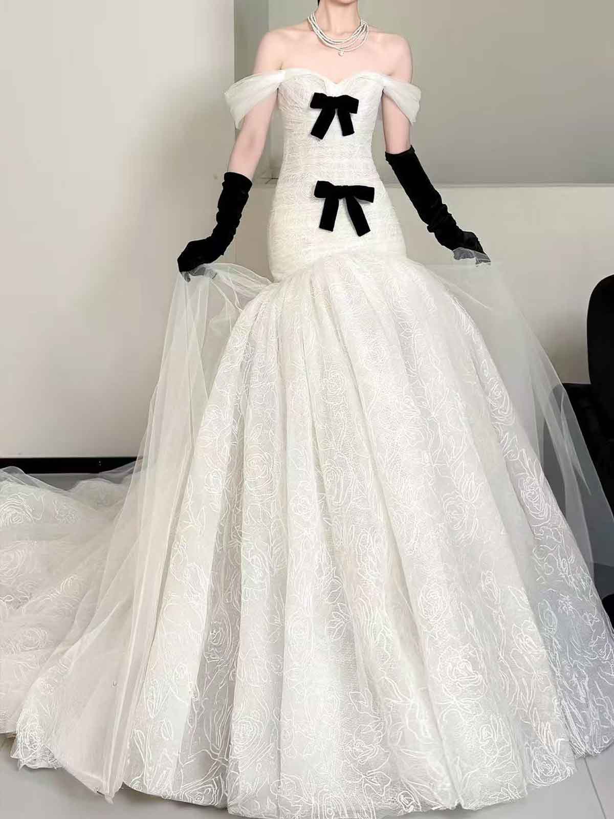 Elegant Off-Shoulder White Mermaid Wedding Dress with Bows