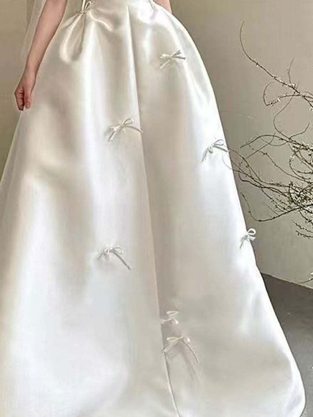 Sweet Strapless Satin Ball Gown with Delicate Bow Embellishments & Sheer Neckline