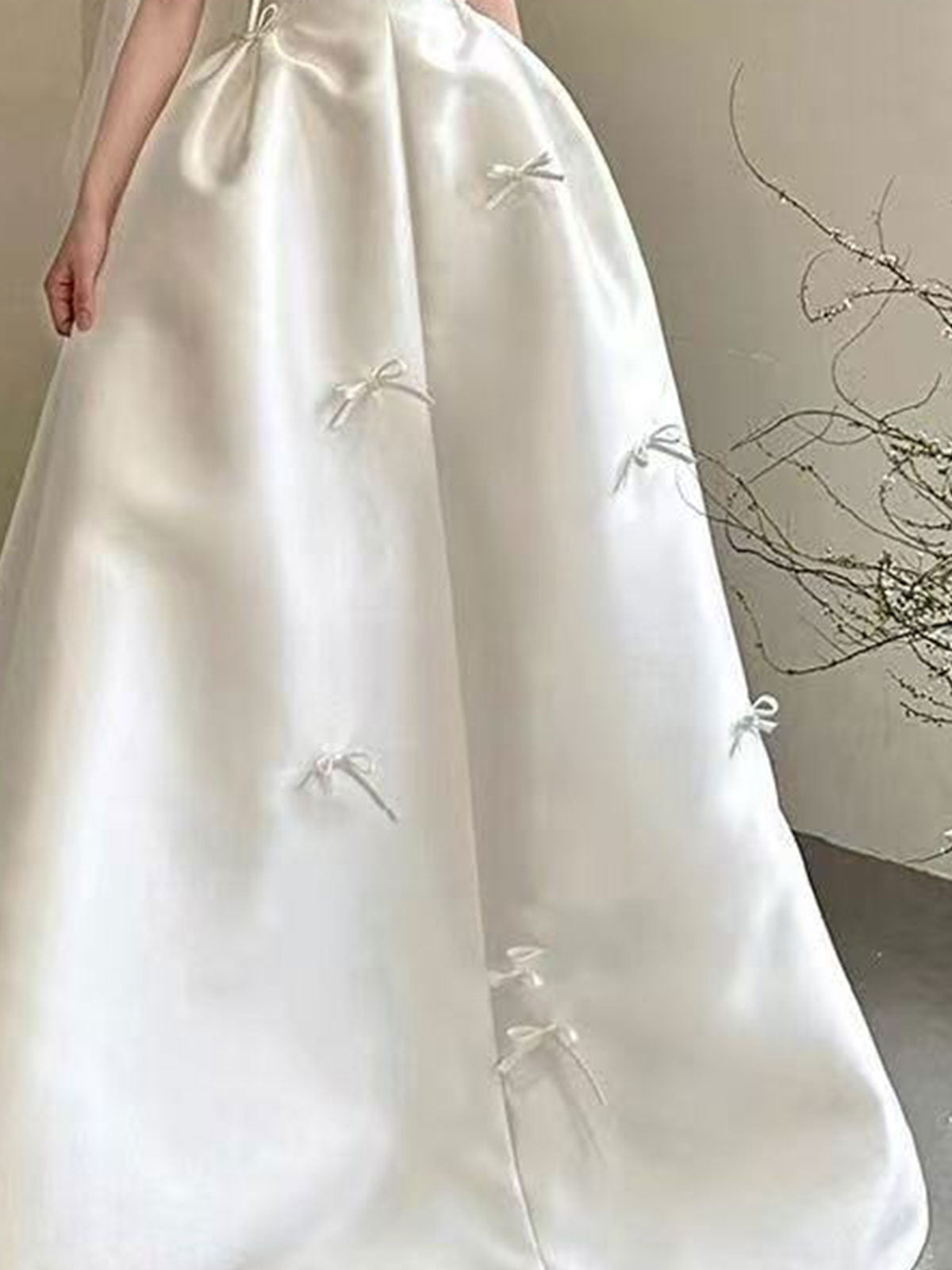 Sweet Strapless Satin Ball Gown with Delicate Bow Embellishments & Sheer Neckline