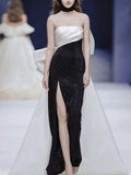Black & White Strapless Color-Block Evening Gown with Oversized Bow Train