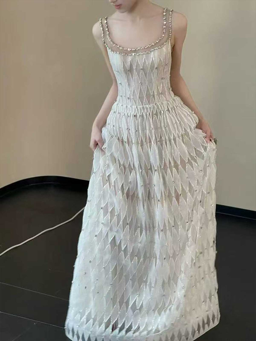 White Sleeveless Gown with Diamond Texture & Crystal Embellished Neckline